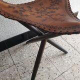 Pair of folding leather tripod stools from the 1950s