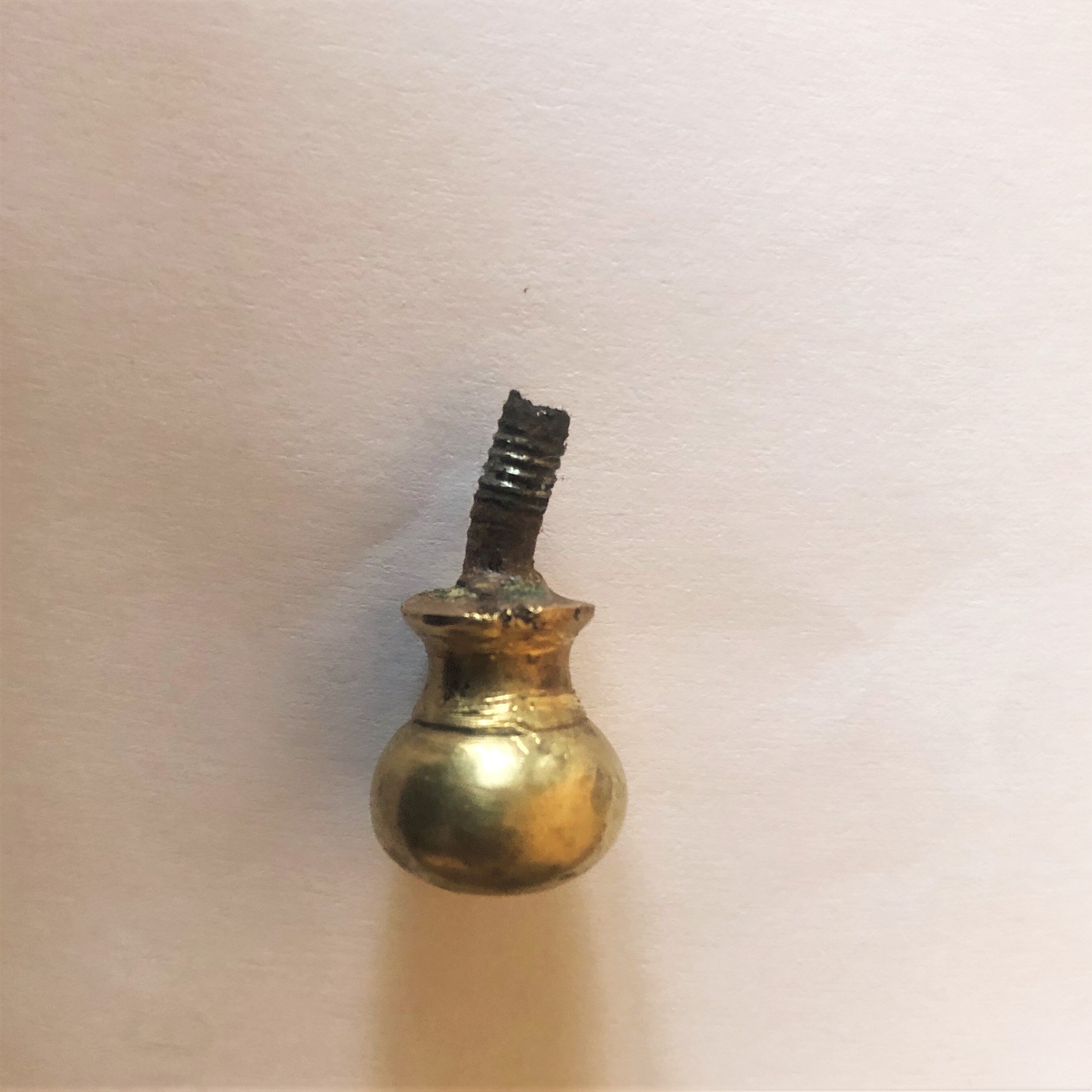 Old gold copper candle holder with pusher