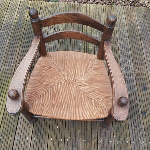 Fauteuil bas paillé de cheminée style Dudouyt