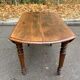 Table ovale à volets extensible Louis Philippe en bois massif du XIXème