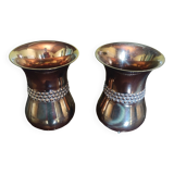 Curved bronze vases