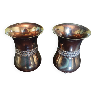 Curved bronze vases