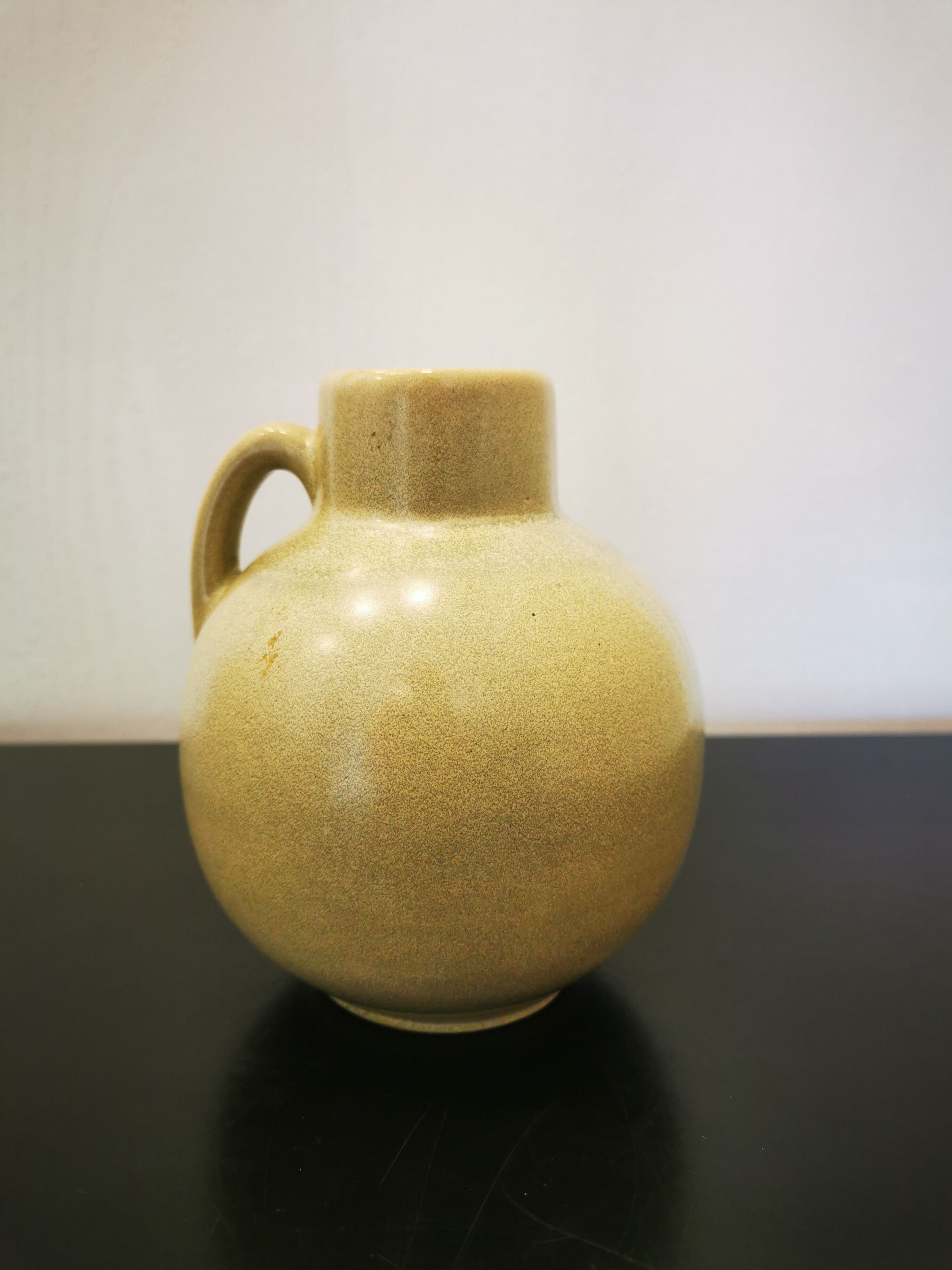 Vintage sleek handle vase