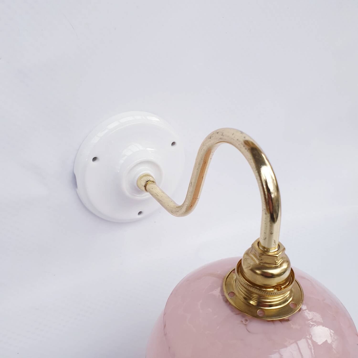 pair of vintage speckled pink and brass wall lights