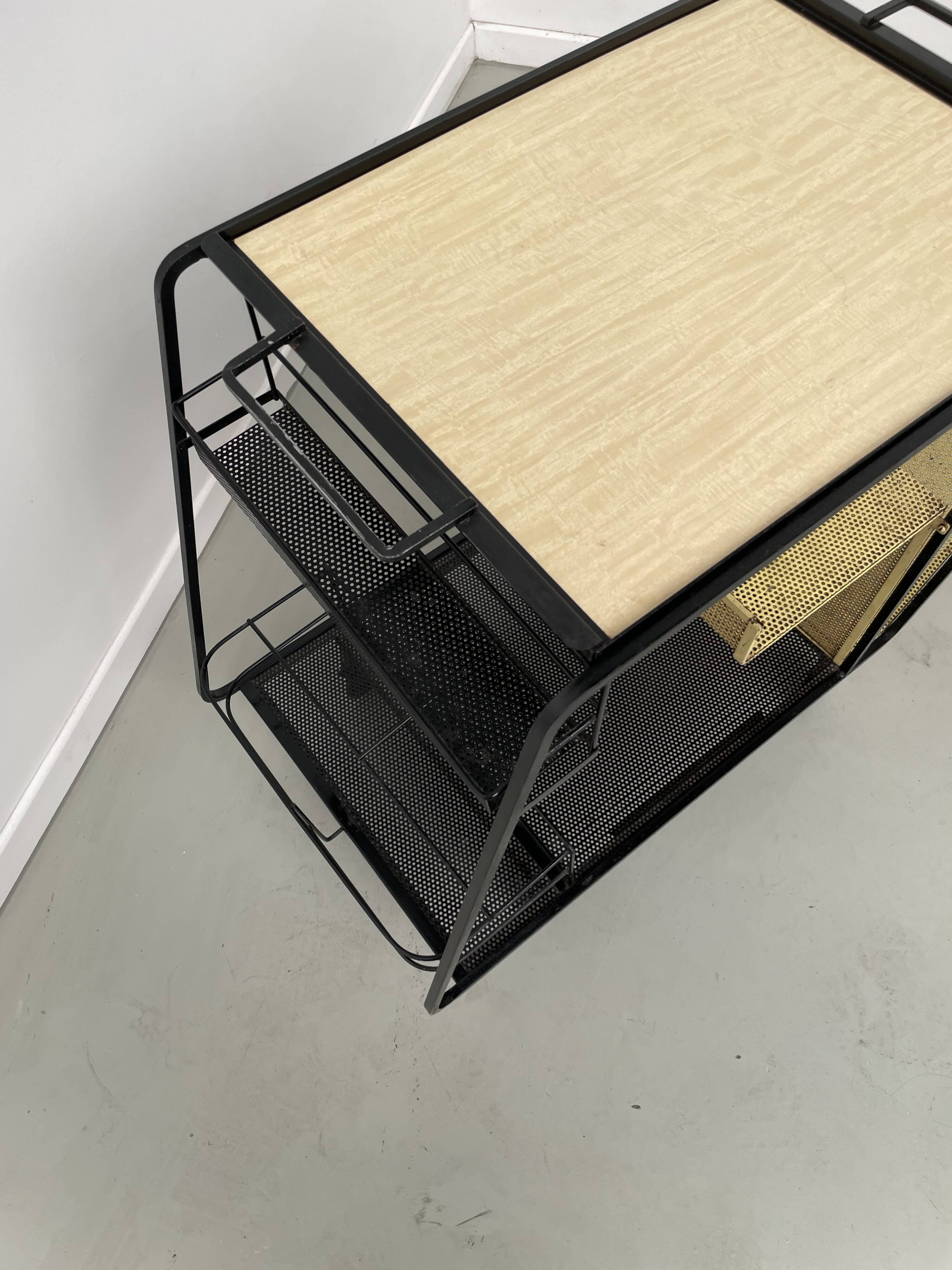 Perforated metal serving trolley in the Mathieu Matégot style