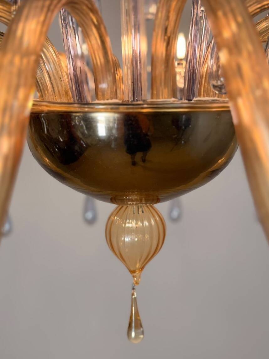 Venetian chandelier in blue and amber Murano glass, 12 light arms, circa 1980.
