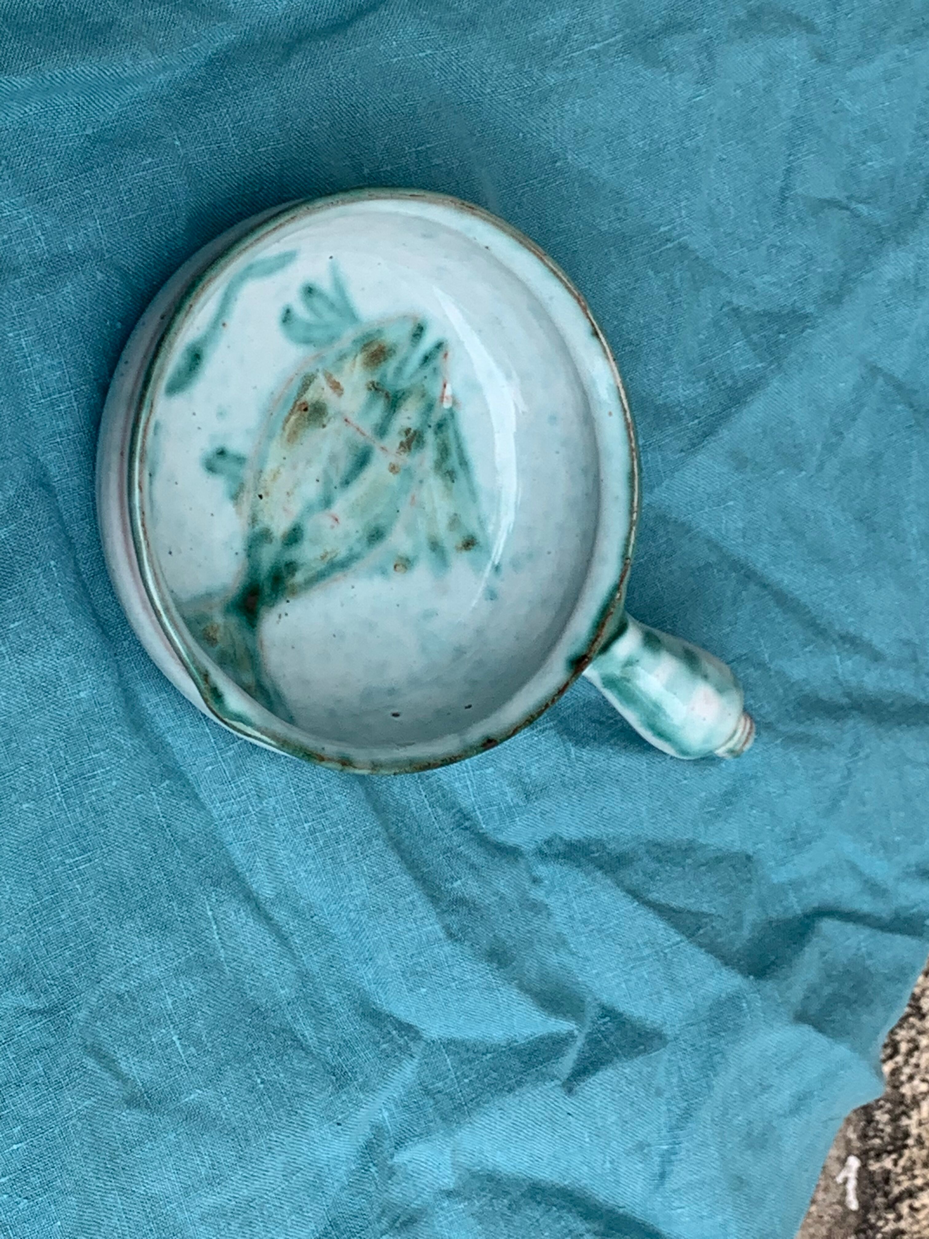 Caquelon, pan sign Humbert pittari vallauris model with blue glazed ceramic fish