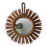 Old large sun mirror in gilded wood