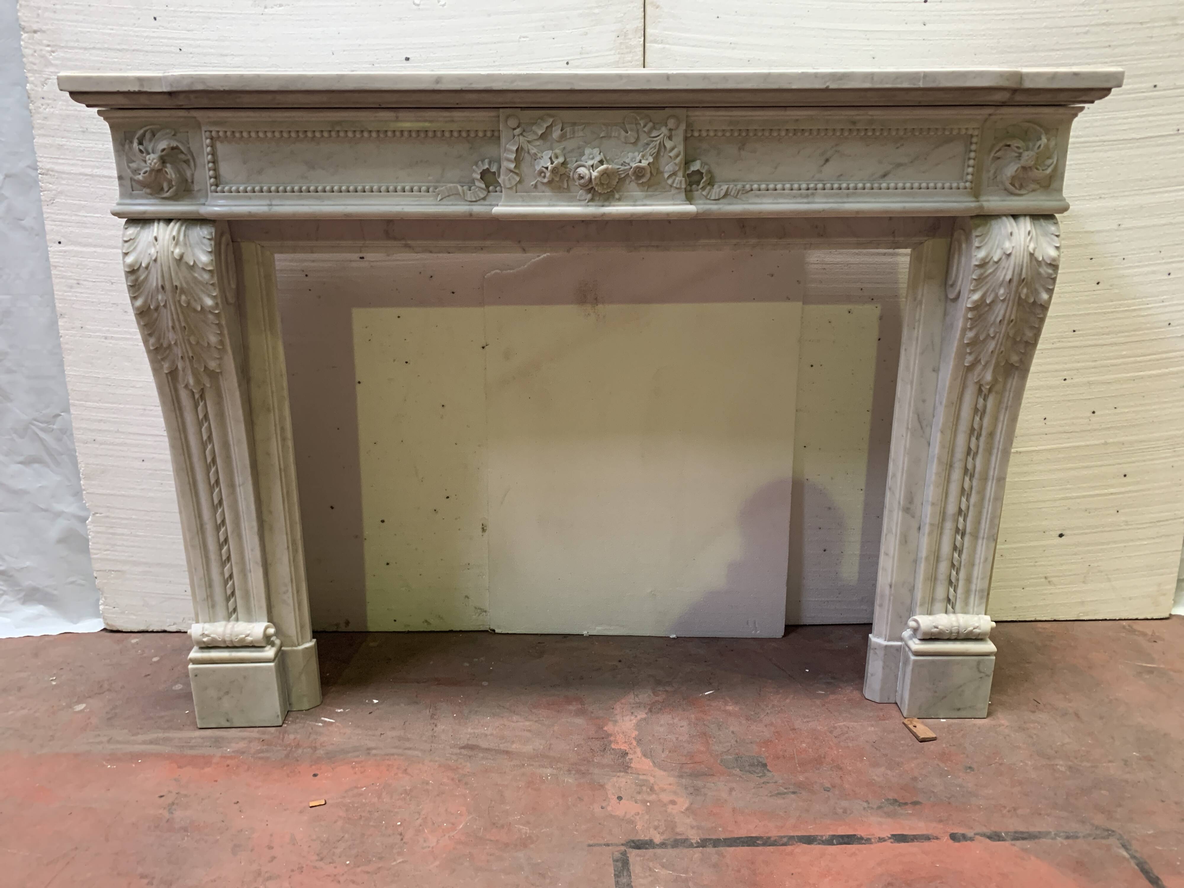 Louis XVI style fireplace in white Carrara marble, 19th century