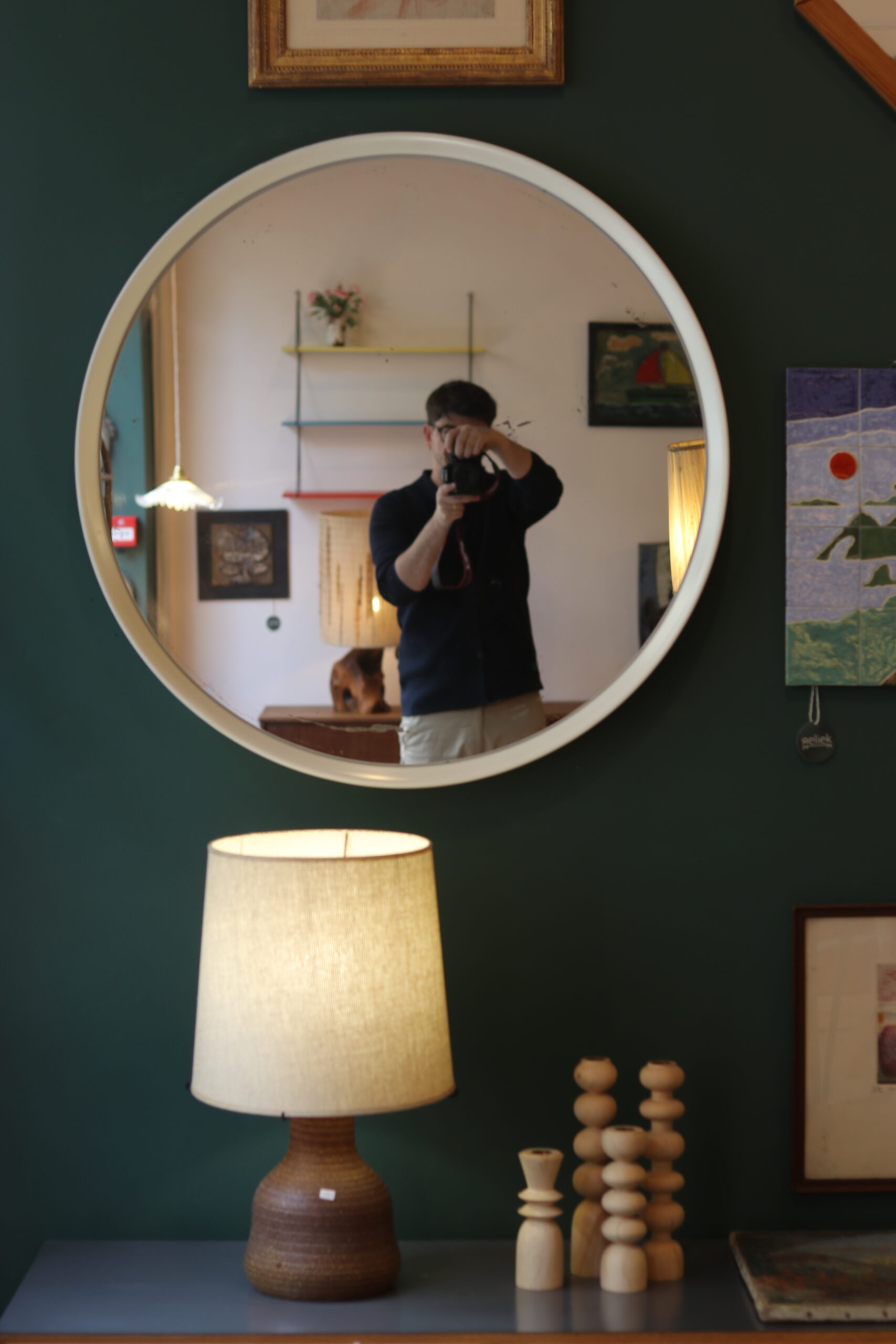 Large vintage circular mirror, plastic frame.