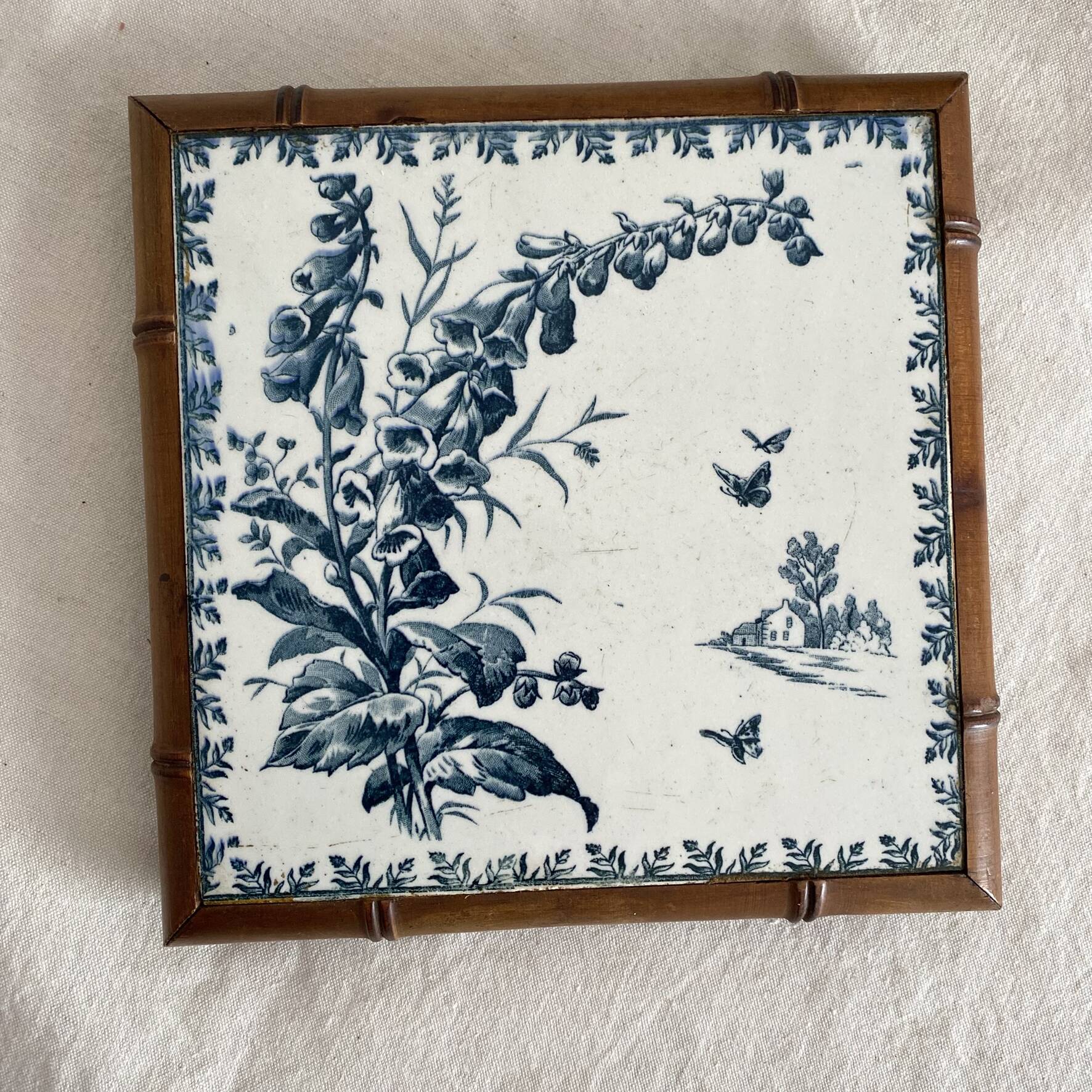 Cast iron trivet Gien Landscape and bamboo-style wood