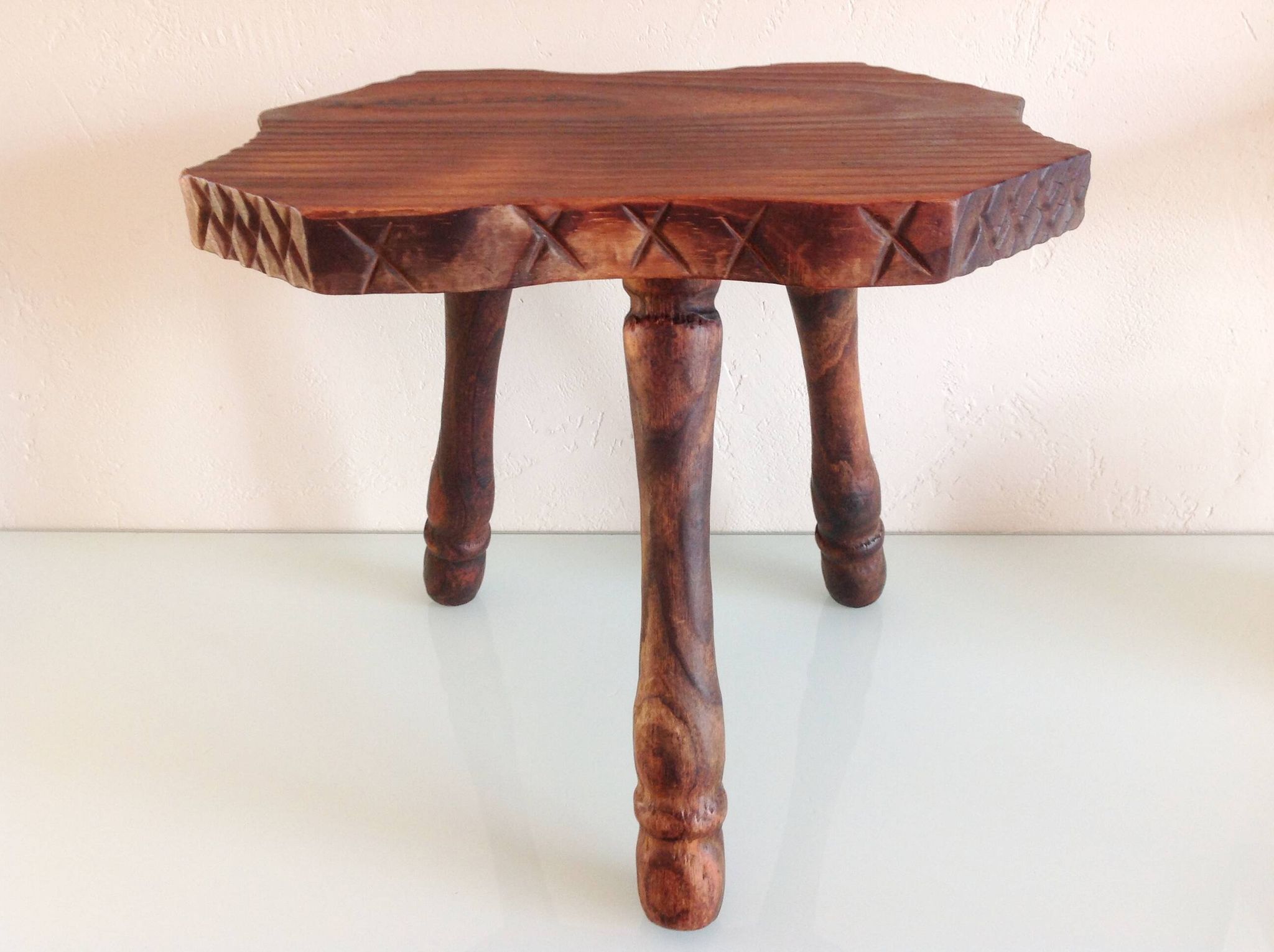 Vintage brutalist wooden tripod stool from the 60s and 70s