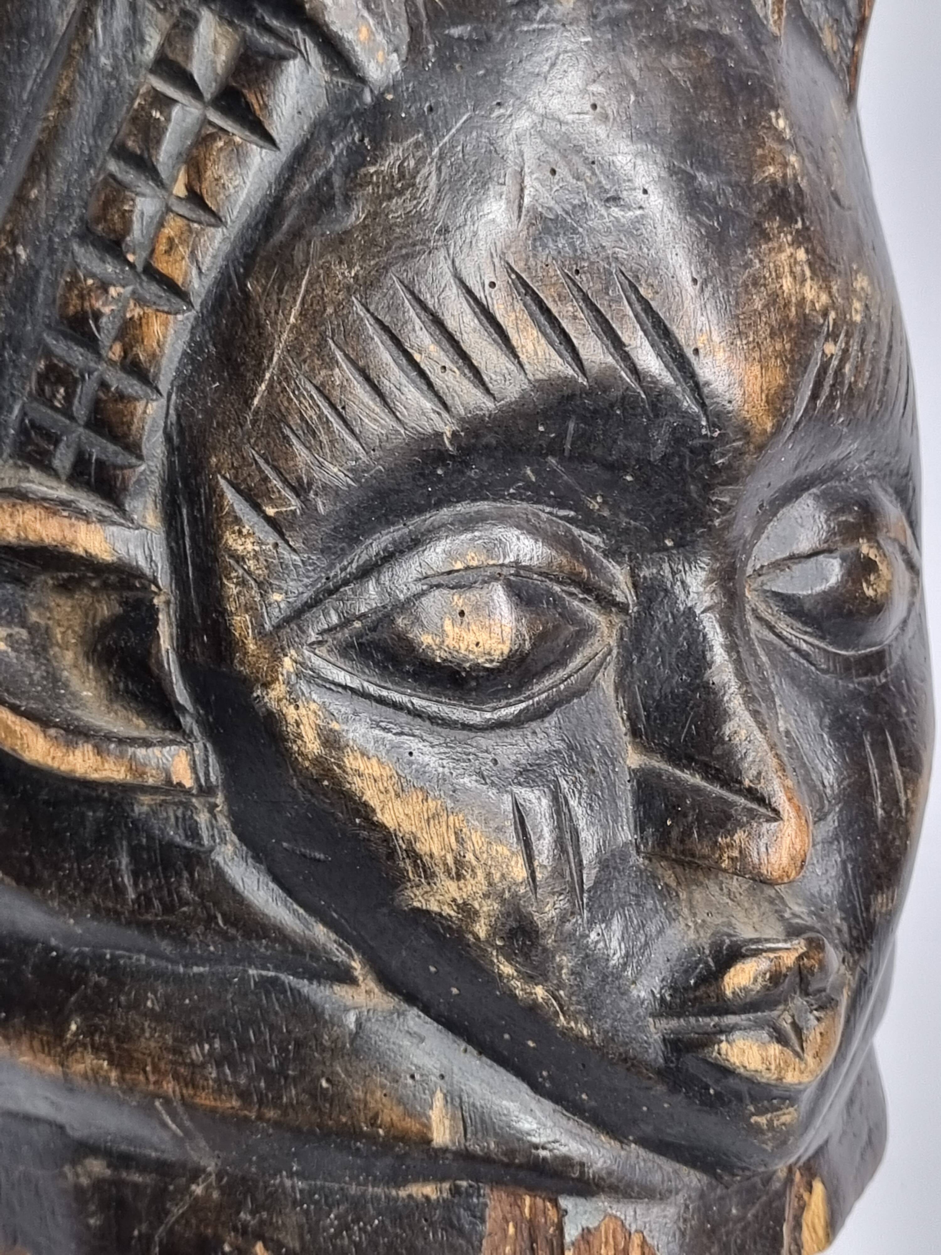 Decorative Carved Wood Guro Helmet Mask – Ivory Coast, 35 cm