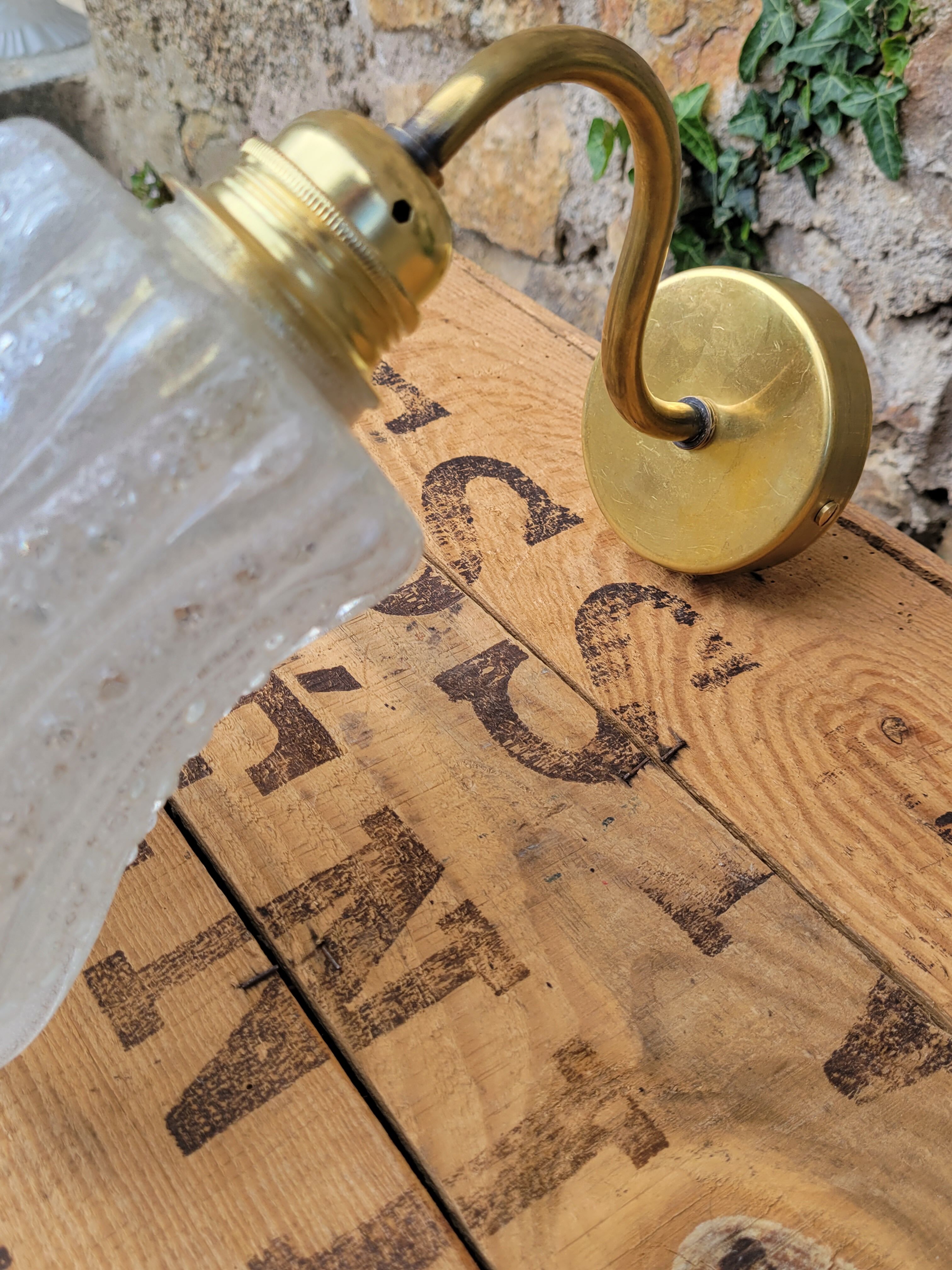 Brass and moulded glass sconce