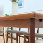 Vintage extendable dining table with 2 extensions in teak.