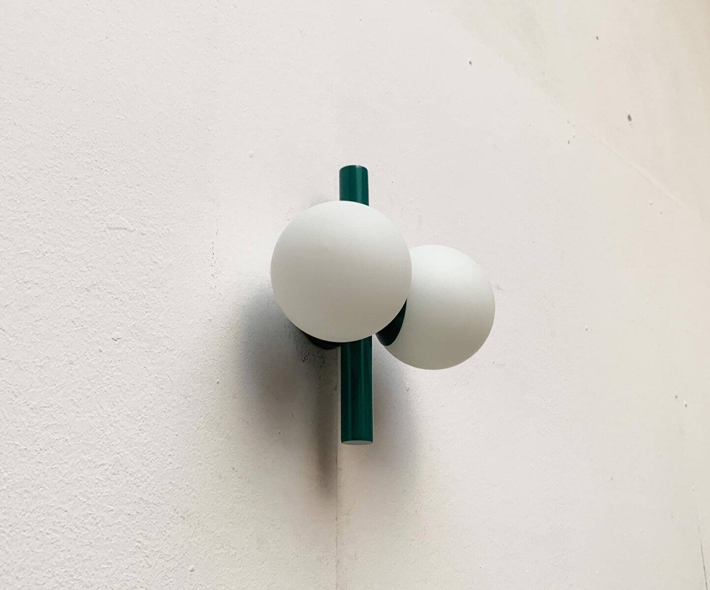 Mid-century German space age wall lamp by Kaiser Idell / Kaiser Leuchten.