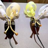 Pair of "vintage" wall lights in brass, perspex, and black bakelite, France Mid-Century