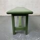 Green wooden bench