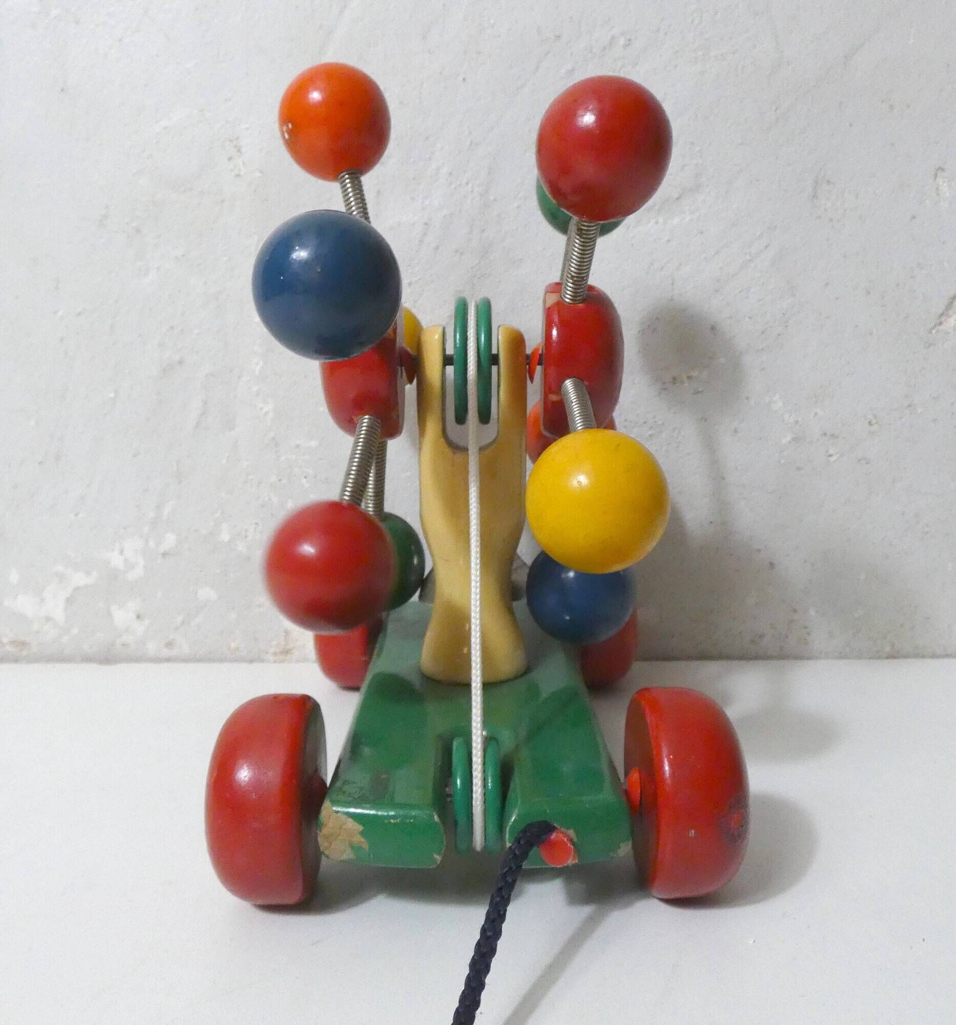 KOUVALIAS vintage wooden pull toy spoutnik multicolour balls