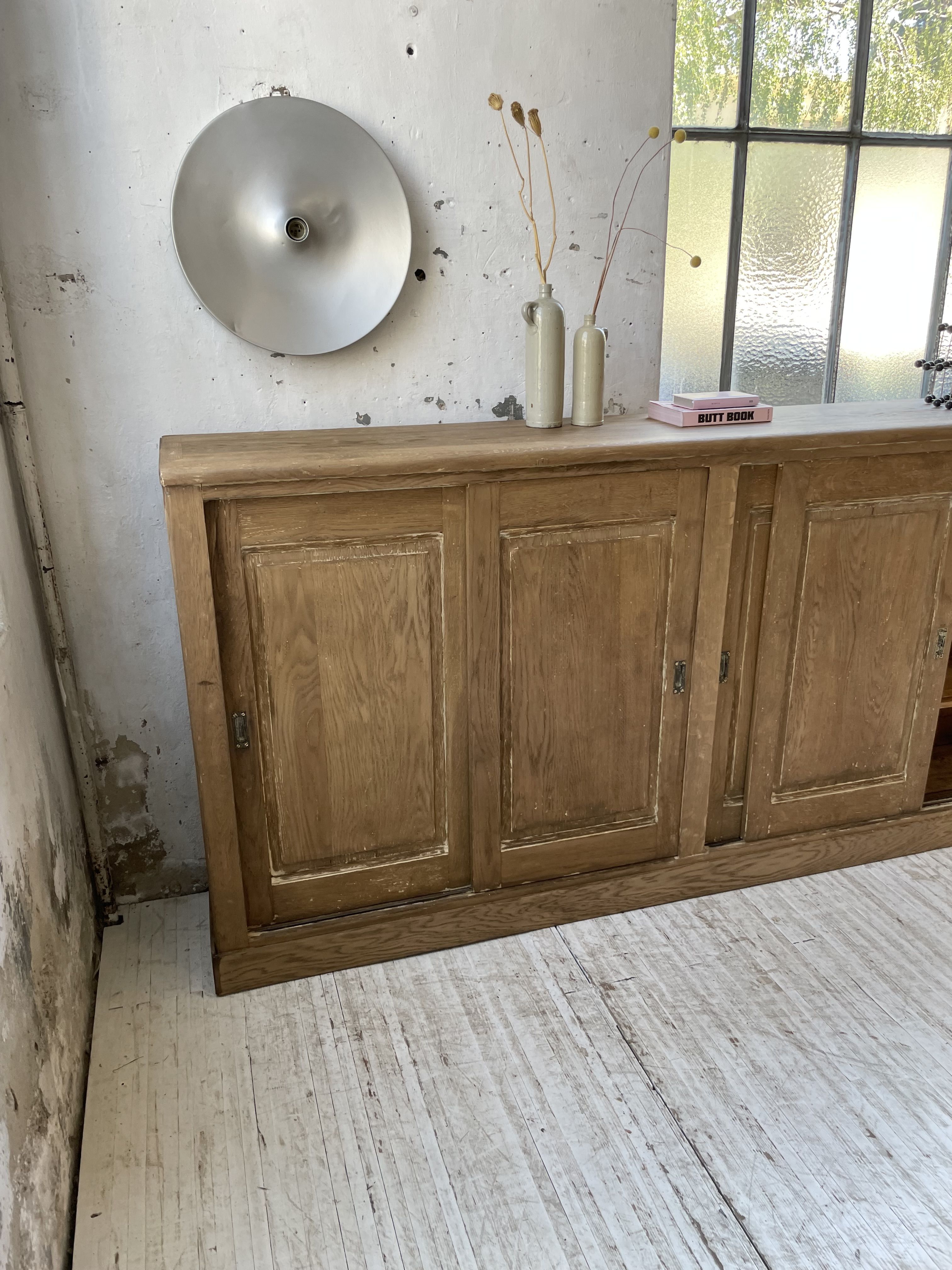 Large row of solid oak loom sliding doors