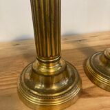 Pair of Louis XVI candlesticks in gilded bronze