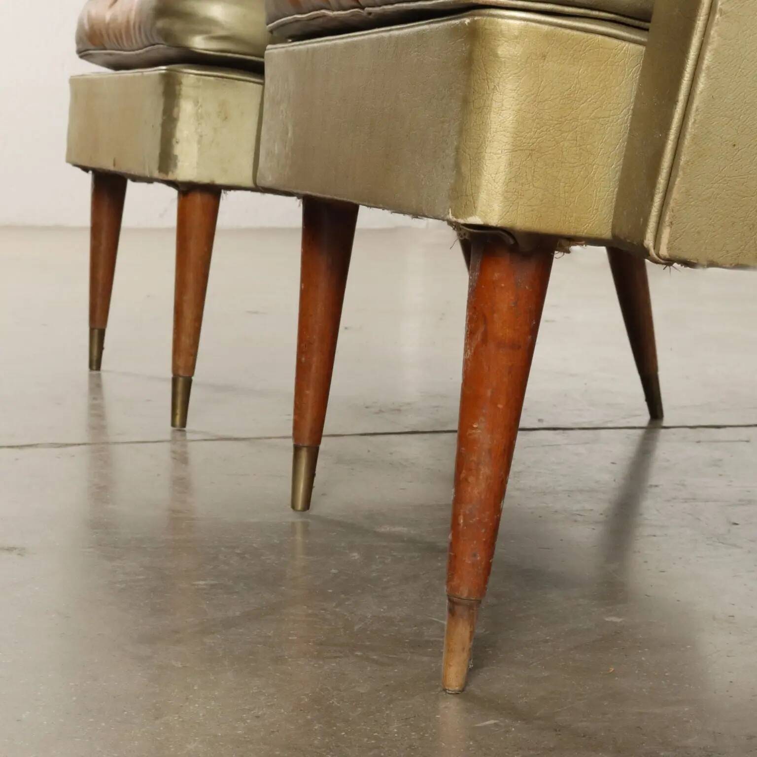 Pair of vintage armchairs from the 1950s in wood and faux leather, Argentina.