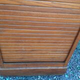 Storage cabinet locker with old wooden curtain
