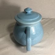 Cracked blue ceramic vintage teapot