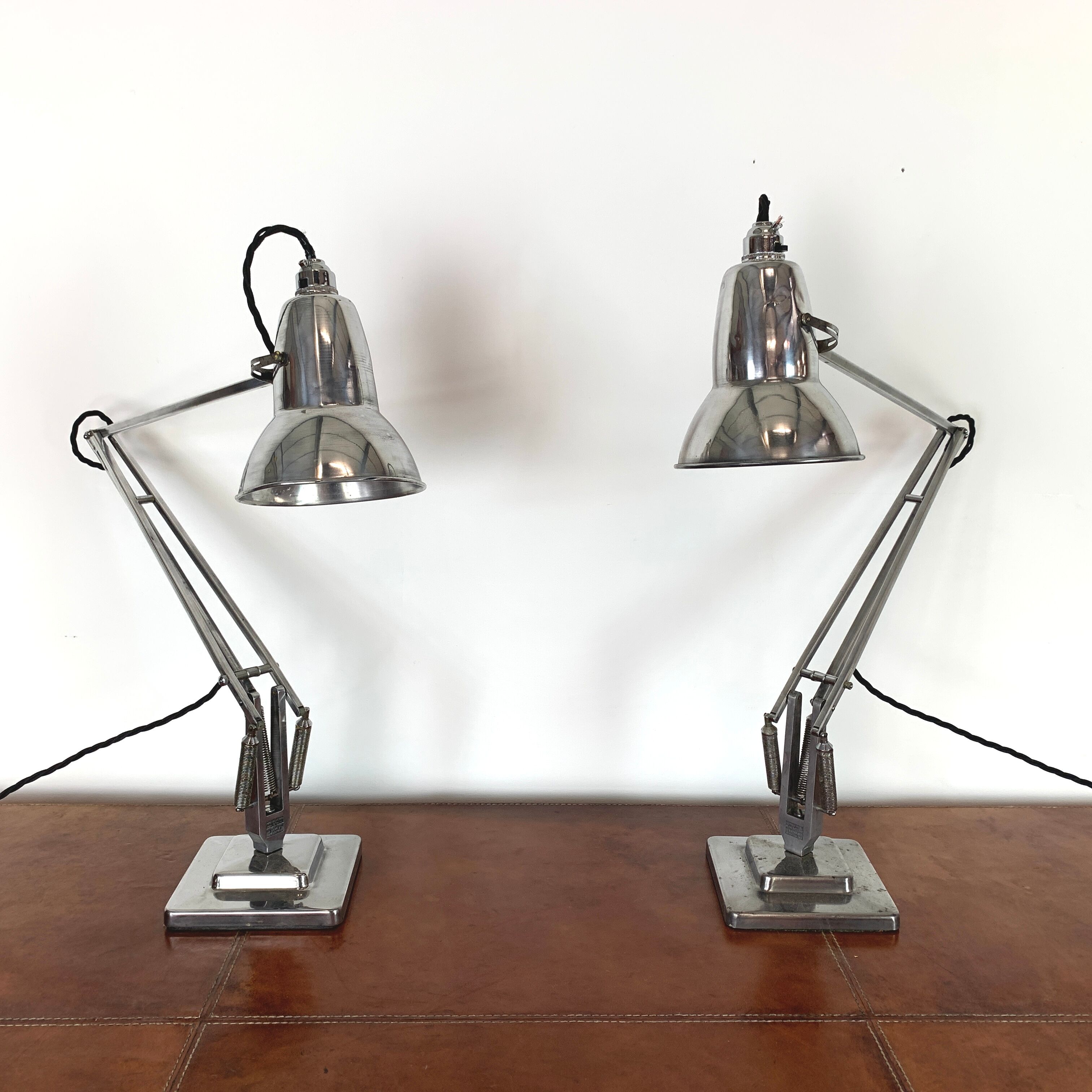 Pair of vintage stripped and polished Herbert Terry anglepoise lamps