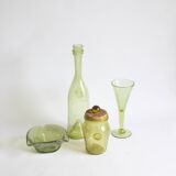 Biot bubble glass ensemble, bottle, jar, bowl and glass.