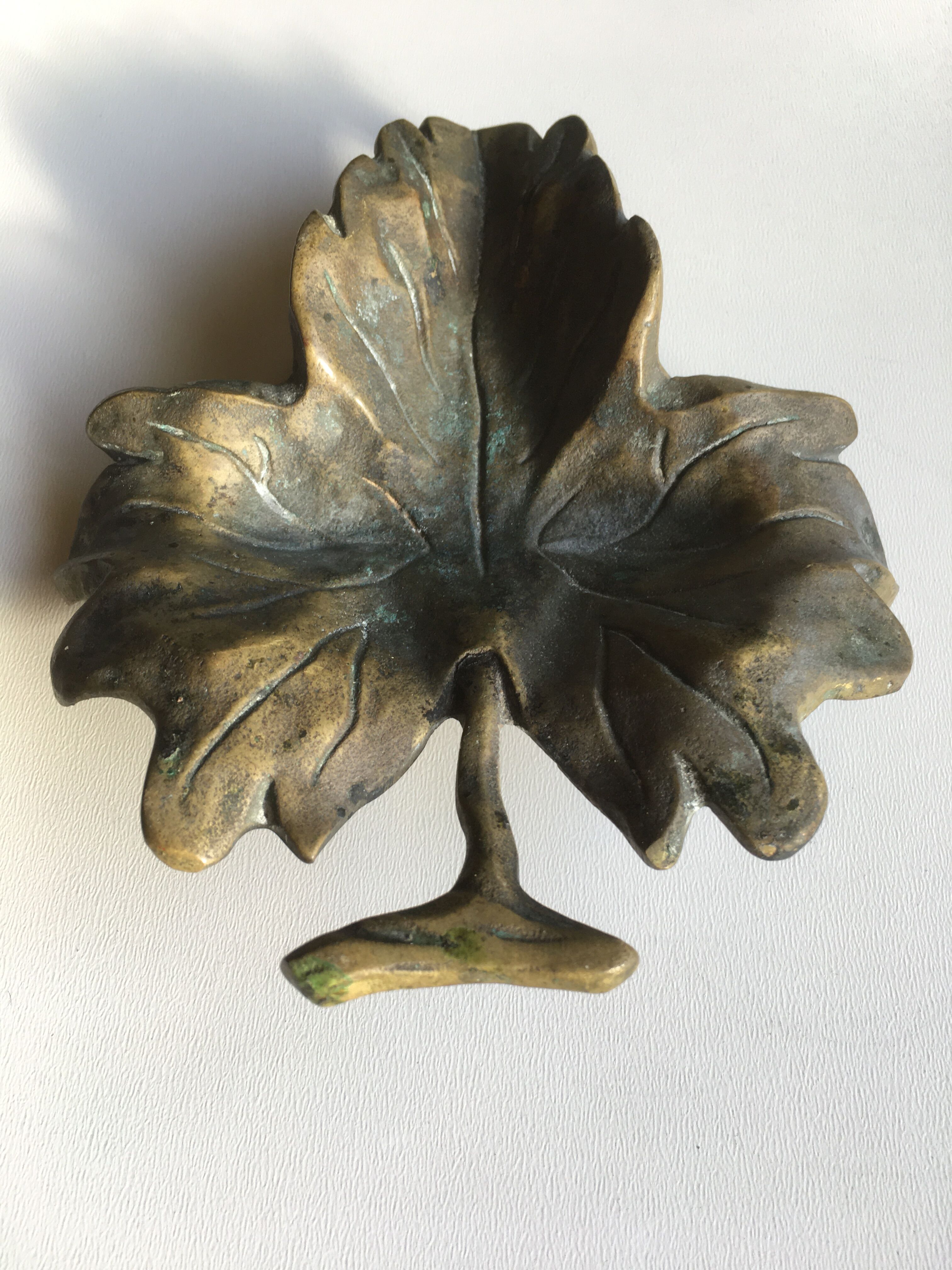 Empty pocket or ashtray leaf in old bronze