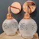 Pair of white ball wall lights