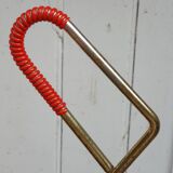 Perforated metal umbrella stand and scoubidou