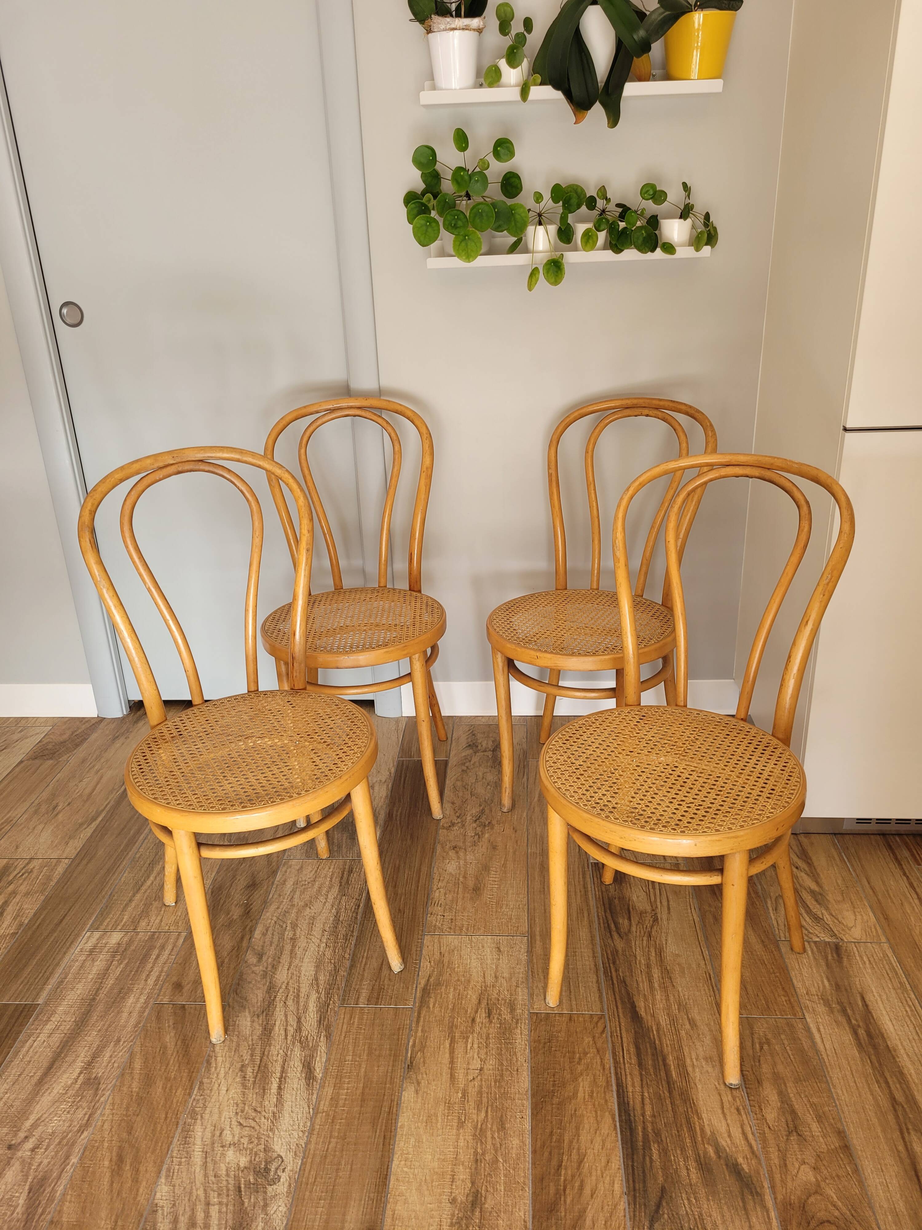 Four cane bistro chairs