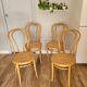 Four cane bistro chairs