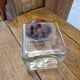 Ancient moulded glass jar with bakelite lid 20th century