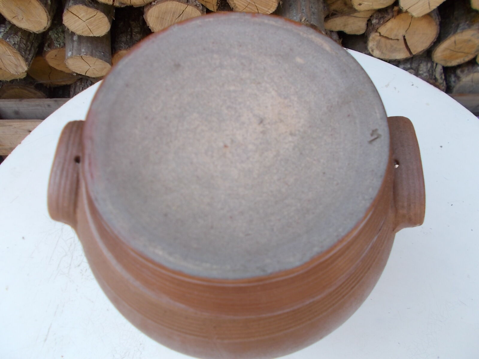 Old sandstone pot and its lid