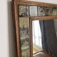 Vintage wall mirror in wood and ceramic tiles