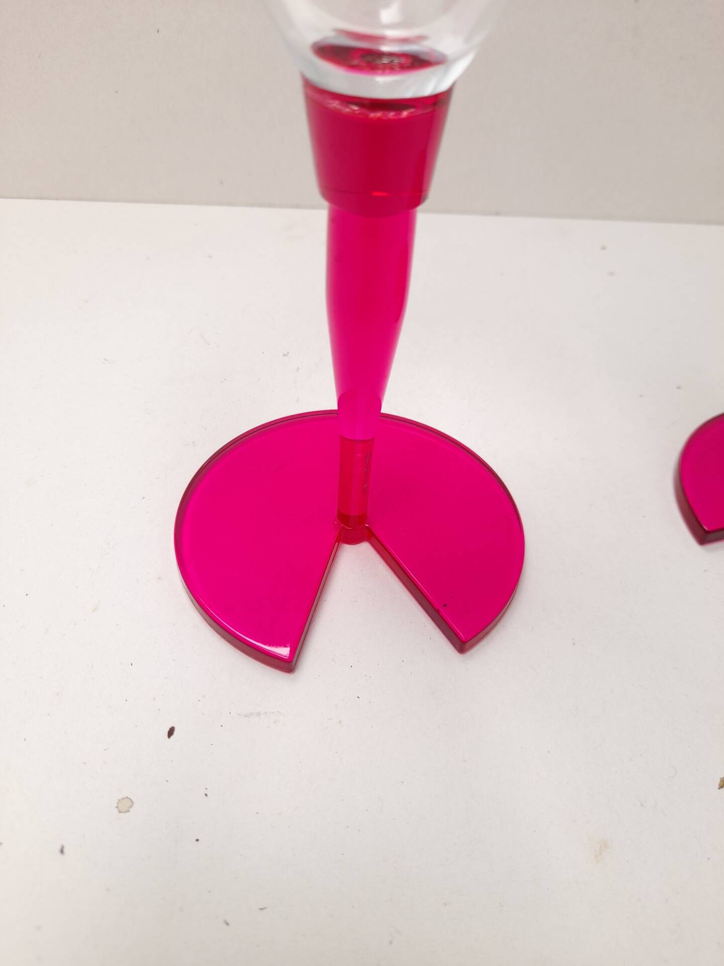 Pair of bright pink cocktail glasses from the 80s.