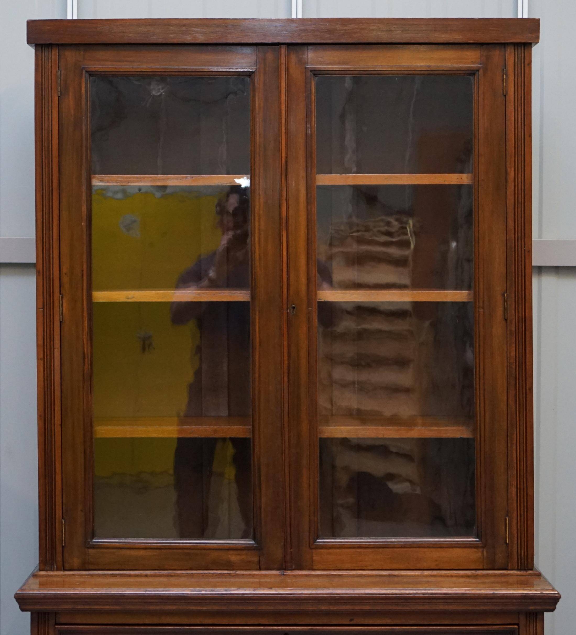 Light wood library with a secretary and leather surface.