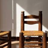 Low fireplace chair attributed to Charles Dudouyt.