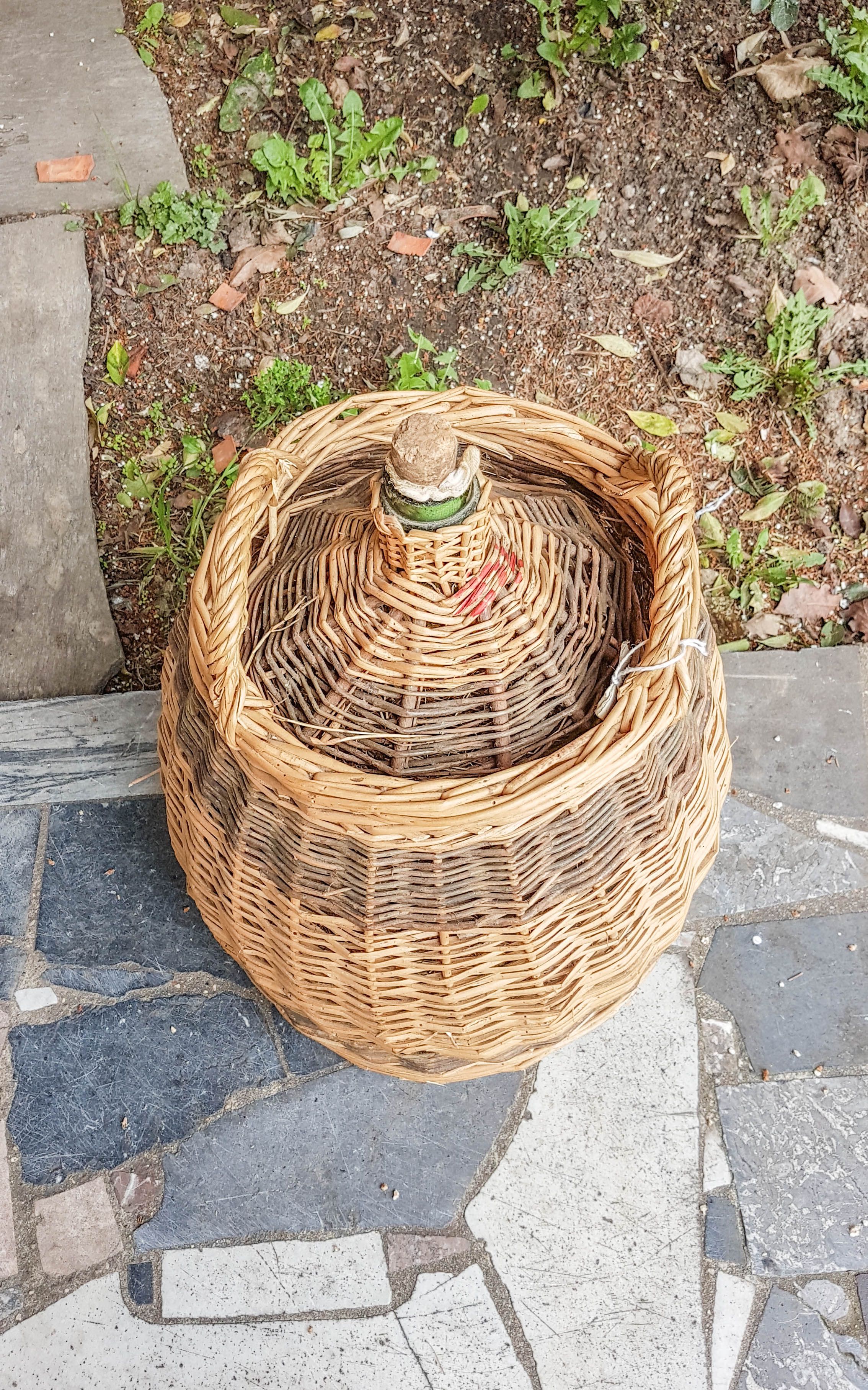 Demijohn covered with wicker