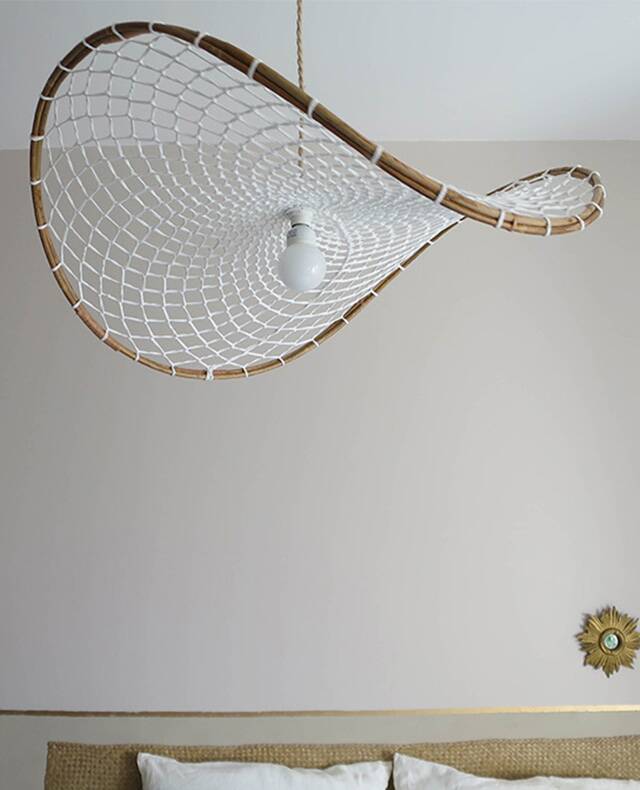 Curved rattan and rope pendant light