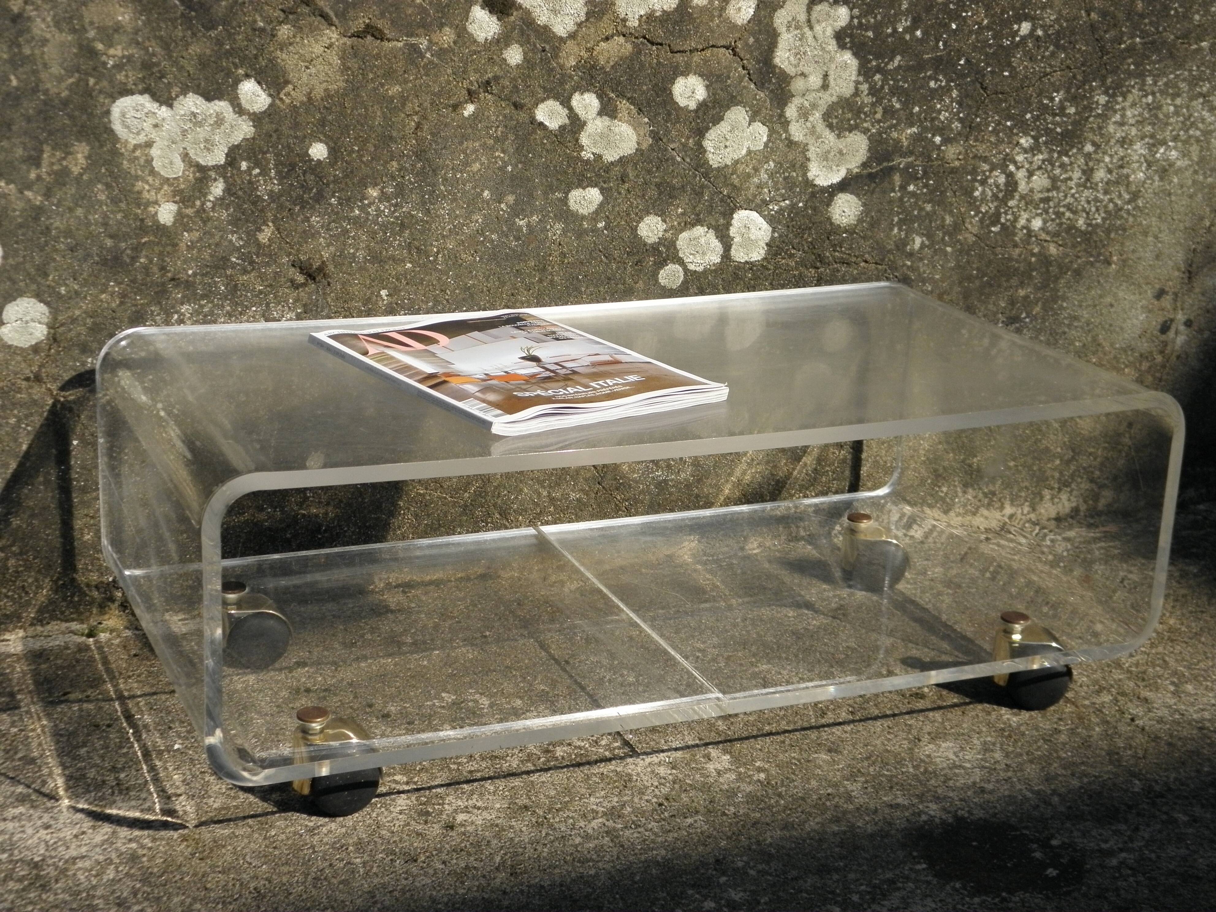 Plexiglass coffee table on wheels
