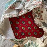 Rattan pouf and vintage fabric