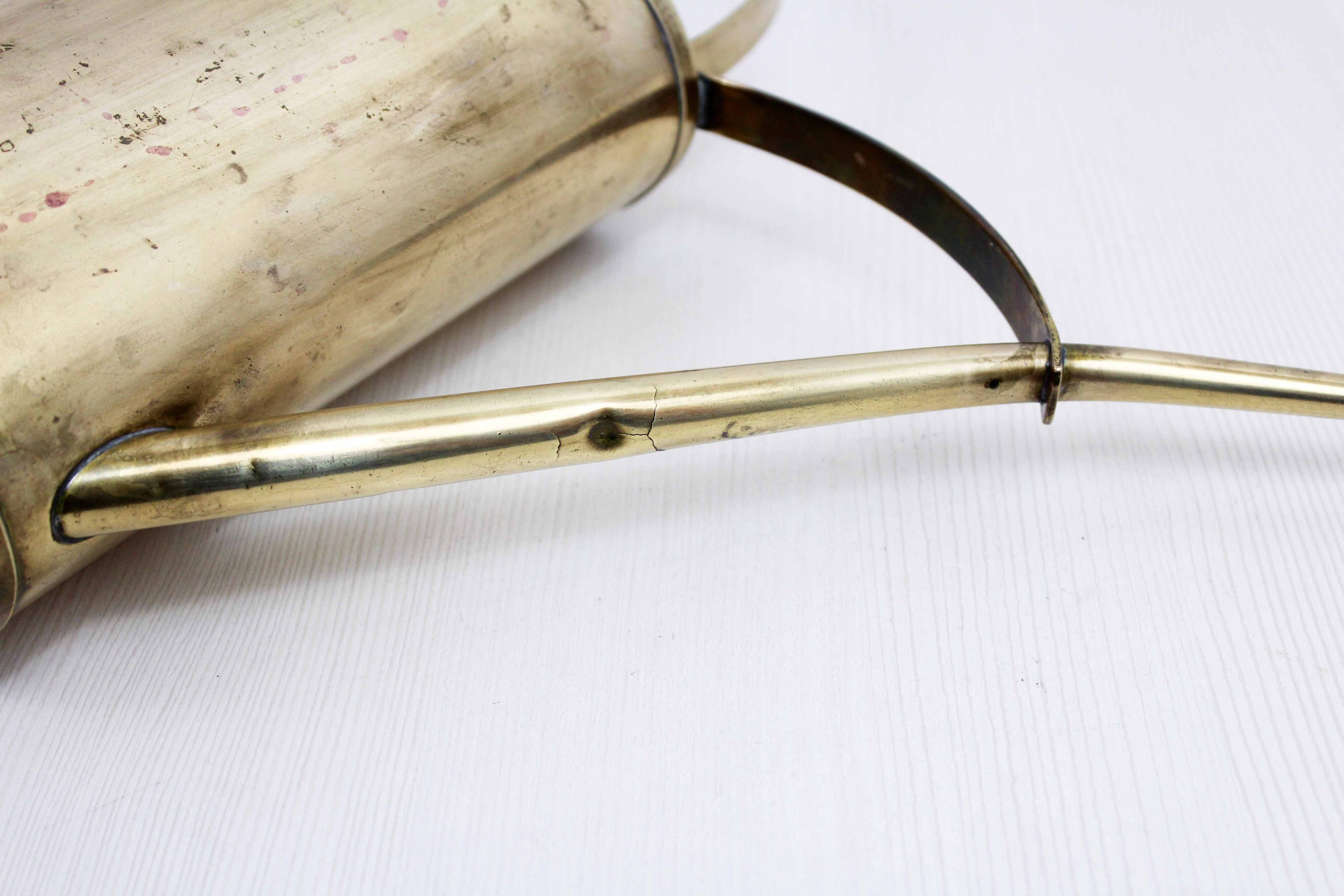 Vintage brass watering can