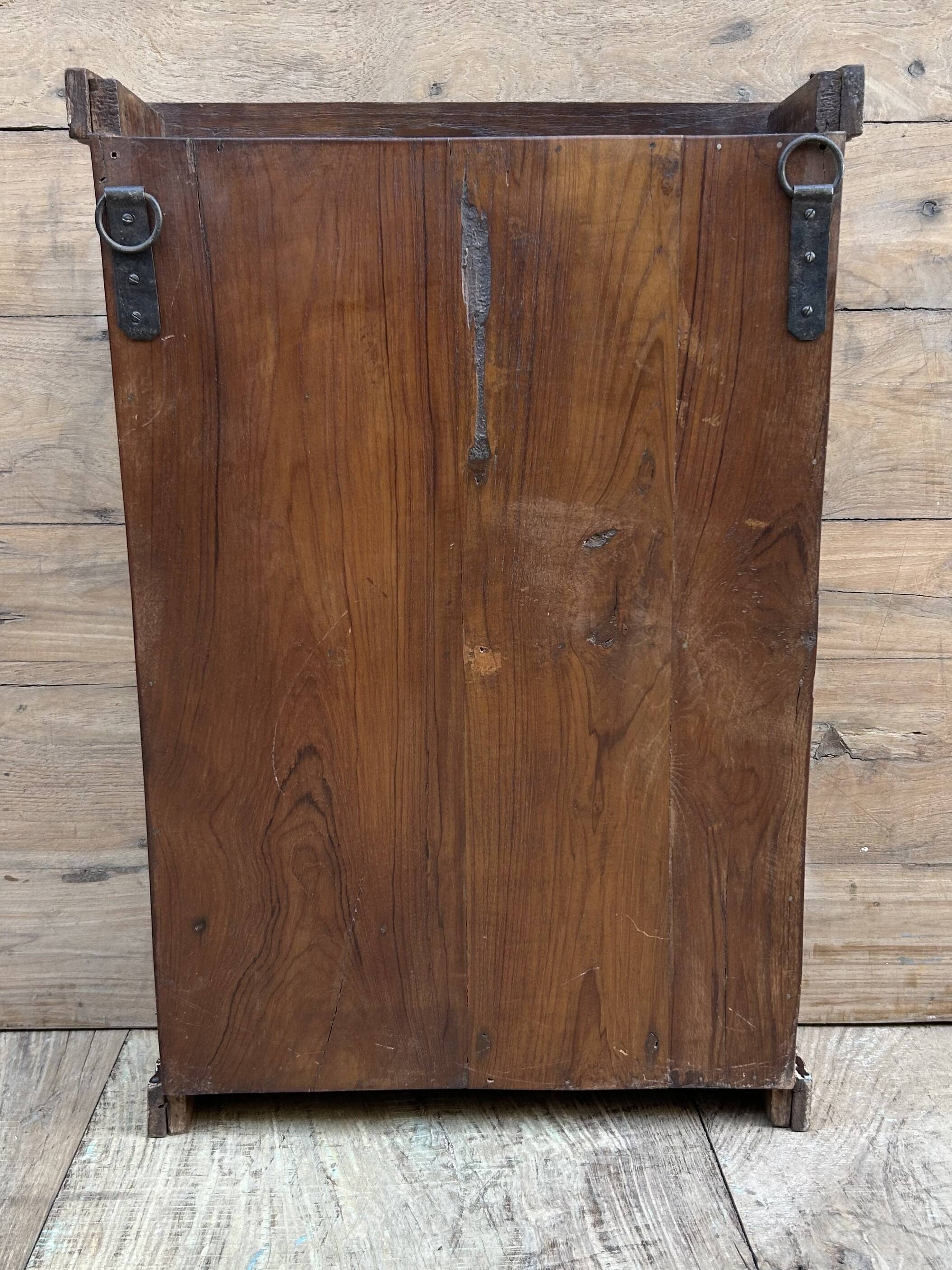 Art Deco wall display cabinet in Burmese teak with original patina.