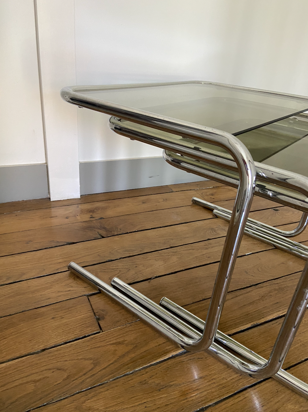 Vintage chrome trundle tables and smoked glasses 1970