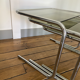 Vintage chrome trundle tables and smoked glasses 1970