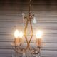 Old 4-light cage chandelier with crystal pendants